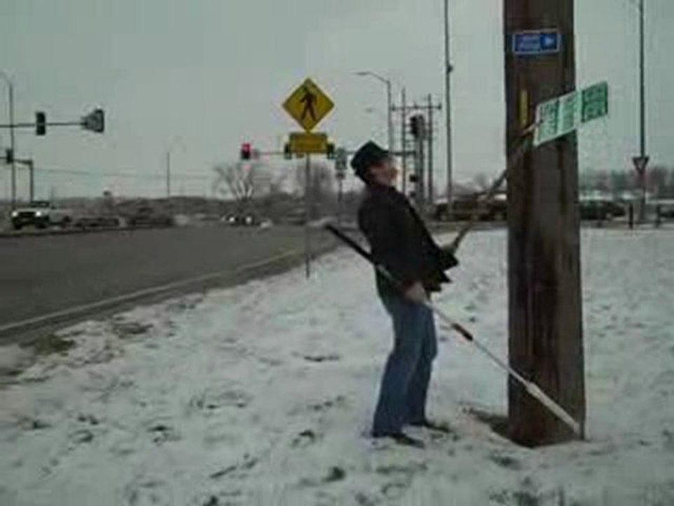 Putting signs up on a windy day
