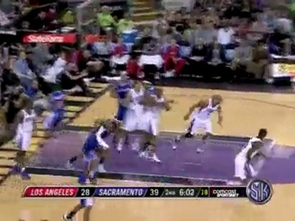 Carl Landry blocks Rasual Butler's shot and Donte Green fini