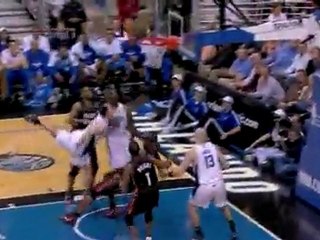 J.J. Reddick drives to the hole to get the underhanded shot