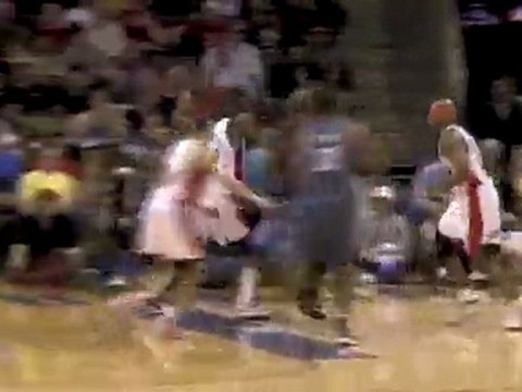 Stephen Jackson spins past a defender and lays it in for two