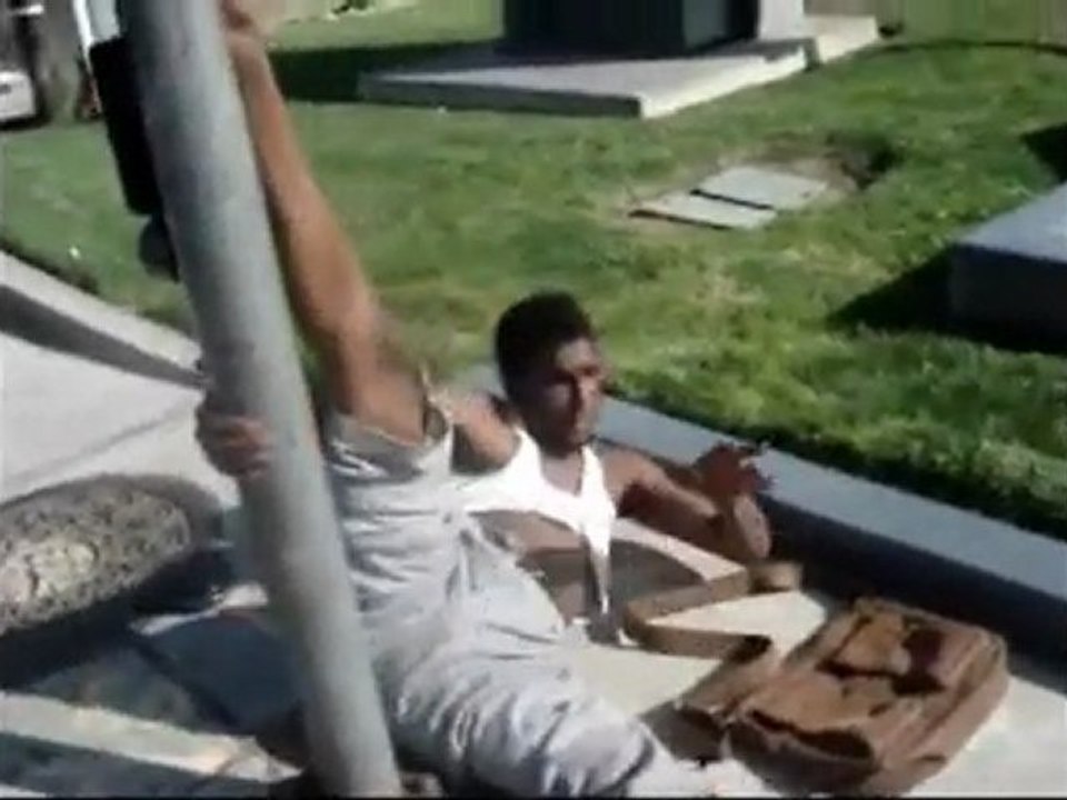 Guy On/And a Pole