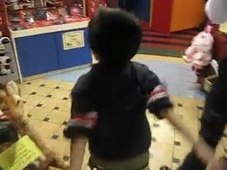 my son walking at sm mall inside the department store