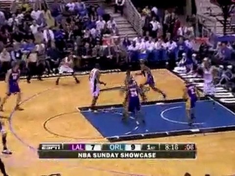 Andrew Bynum blocks Dwight Howard's shot during the first qu