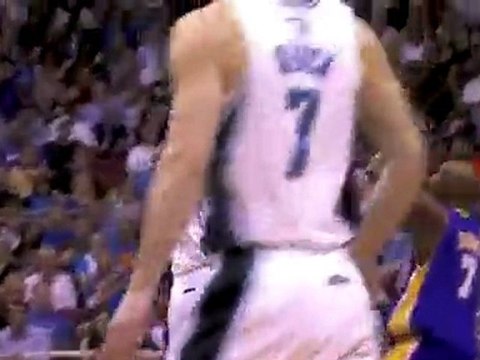 Marcin Gortat goes right over the top of Lamar Odom with a b