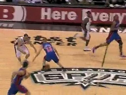 Manu Ginobili goes through the legs of Sergio Rodriguez, ina