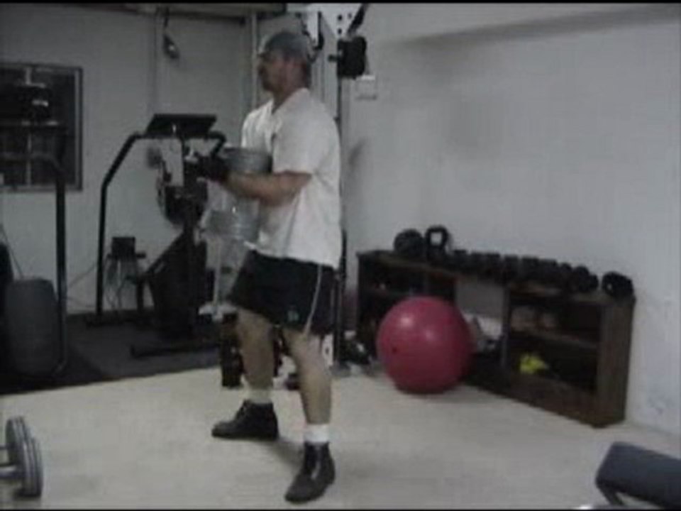 Dumbell Zercher Squats