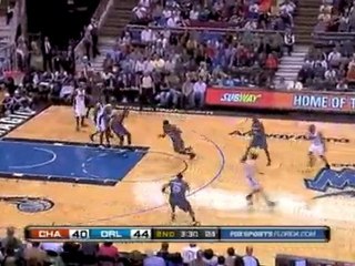 Raymond Felton loses his handle on the ball but Dwight Howar