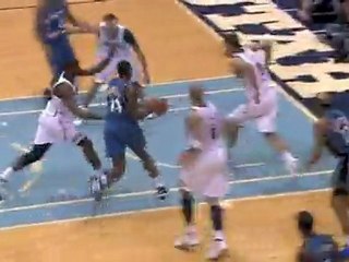 Mehmet Okur blocks the ball right back into play against the