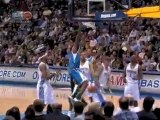 Emeka Okafor grabs the rebound and puts down the dunk with a