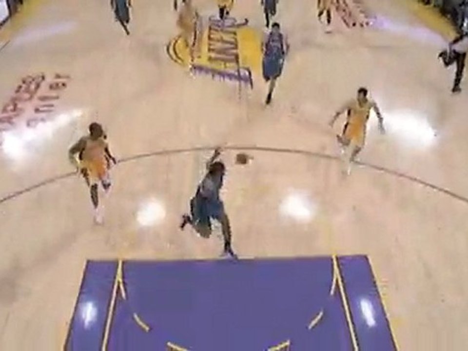 Jordan Farmar passes to Kobe Bryant who throws a behind-the-
