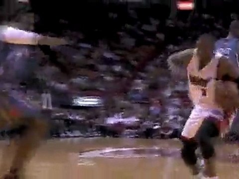 Dwyane Wade goes through the lane with a pretty behind-the-b