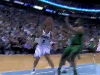 Deron Williams pumps fakes the ball underneath the basket fo