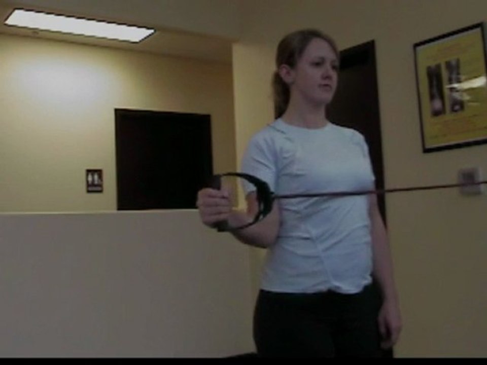 Pewaukee chiropractors demo rotator cuff exercises