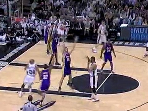 Tim Duncan dumps the pass off to Richard Jefferson, who fini