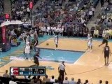 Marcus Camby throws down a two-handed jam off the feed from
