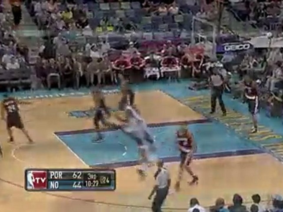 Emeka Okafor gives the head fake to Marcus Camby and throws