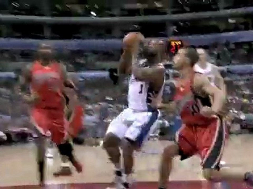 Baron Davis drives the lane and gets this bucket to drop plu