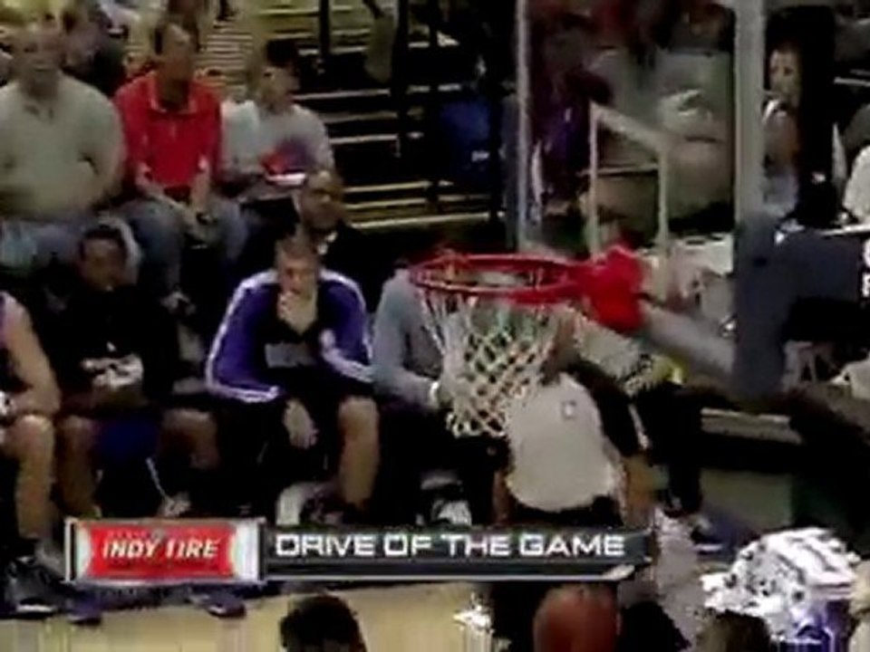 Danny Granger drives baseline and gets the reverse layup to