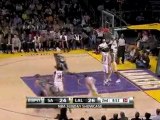 Manu Ginobili drives baselinen for the reverse layup.