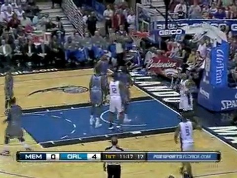 Vince Carter drives to the bucket for the layup and the foul