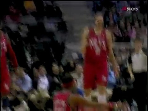 Keyon Dooling gets fouled as he hits the long 3-pointer.