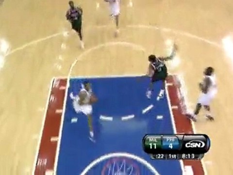 Jrue Holiday dishes to Andre Iguodala for the big one-handed