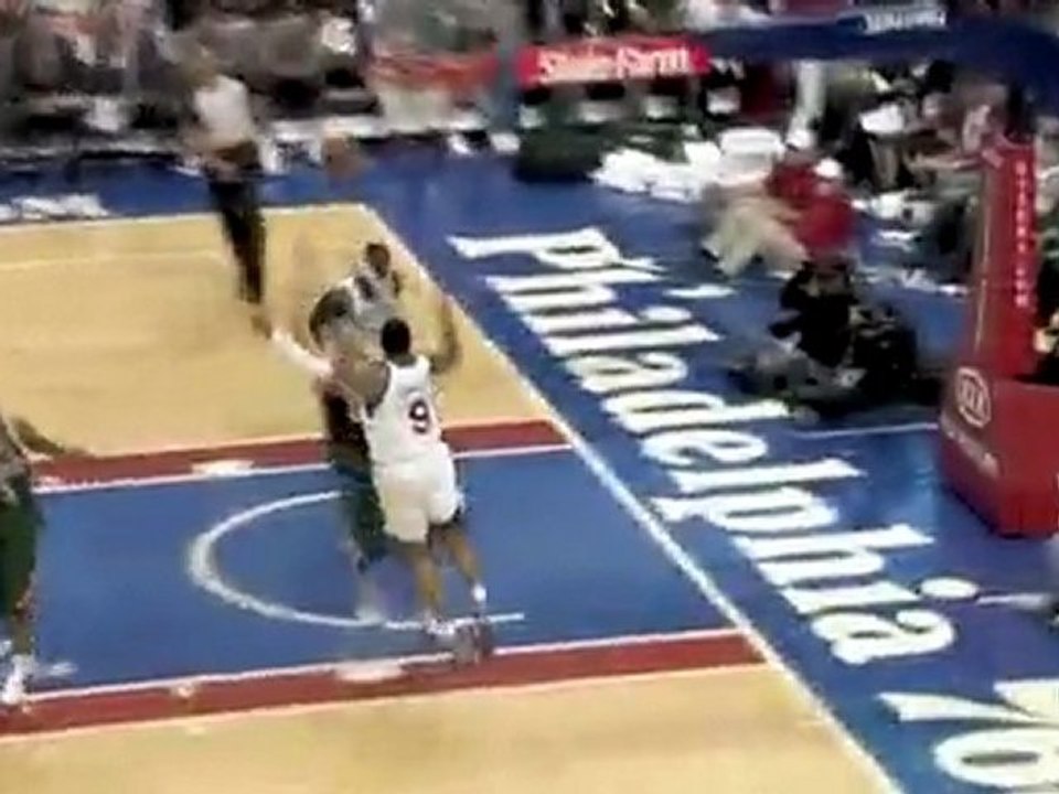 Andre Iguodala hits Samuel Dalembert with a pretty mid-air a