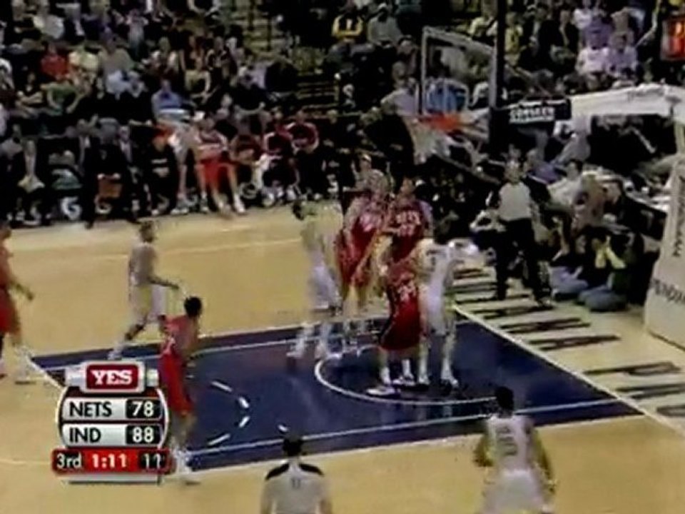 Josh Boone rises up to swat Josh McRoberts' shot away.