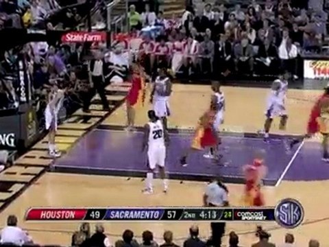 Kevin Martin drives baseline and finishes with the two-hande