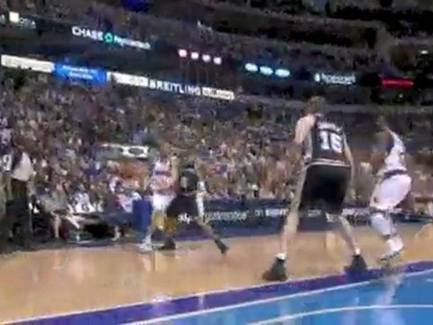 Jason Kidd drives the basline and gets fouled as his shot dr