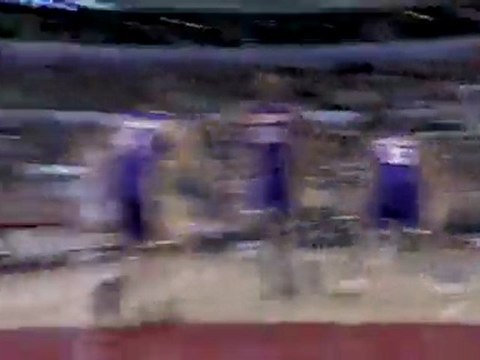 Mardy Collins drives the lane and drops a perfect hook shot.