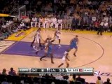 Kobe Bryant drives the lane and finishes strong.PlayOff 201