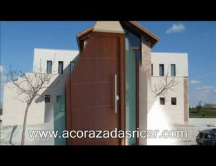 Puertas Acorazadas para Exteriores Decoradas en Madera y Alu