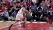 Joakim Noah drives the lane and slams it home with two hands