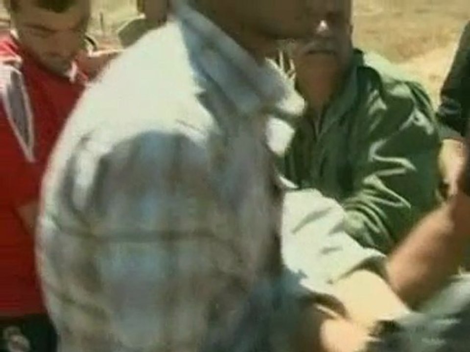 Palestinians and Israeli soldiers clash