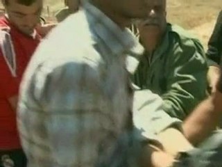 Palestinians and Israeli soldiers clash