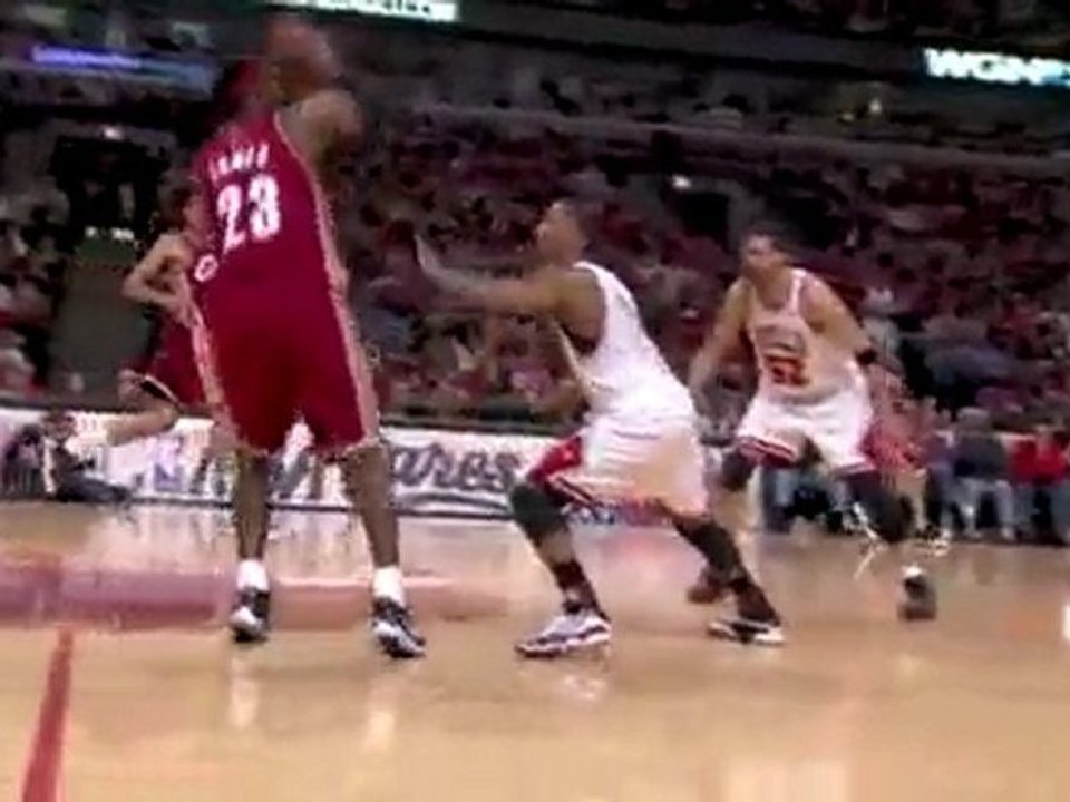 LeBron James sinks a three-point shot and beat the buzzer a