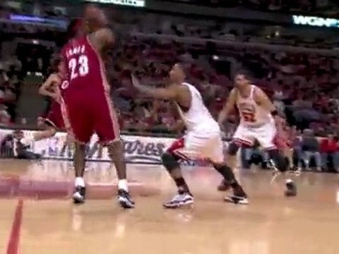 LeBron James sinks a three-point shot and beat the buzzer a