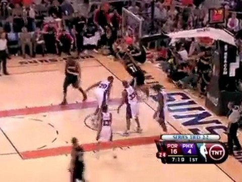 Marcus Camby grabs the offensive board and throws down the s