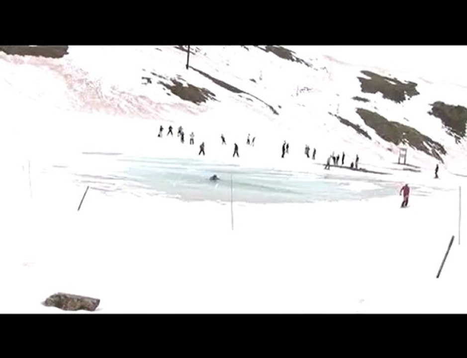 Abasin pond skim crash snowboarder goes for a swim
