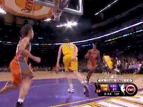 Derek Fisher blocks a pass into the hands on Lamar Odom. Ro