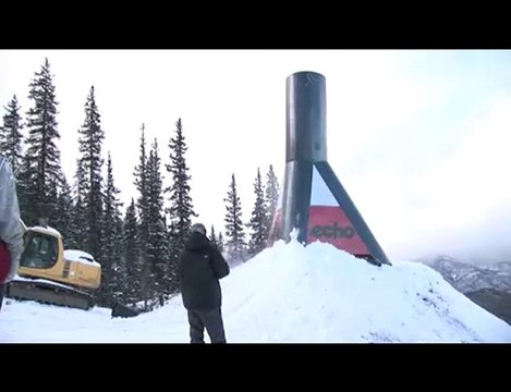 faceplant on a snowboard jib