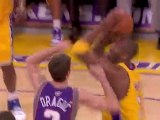 Kobe Bryant drives on Goran Dragic, jumps in the air and ext