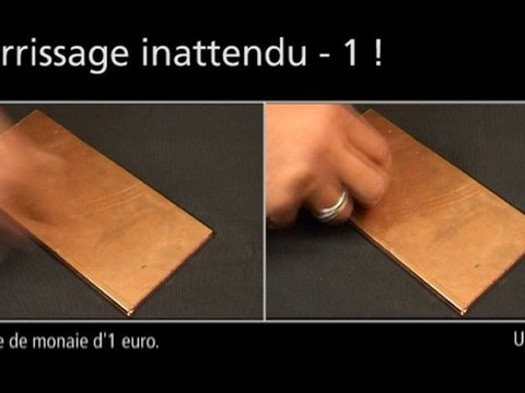 Le jet de l’aimant et la pièce sur la plaque de cuivre - 1