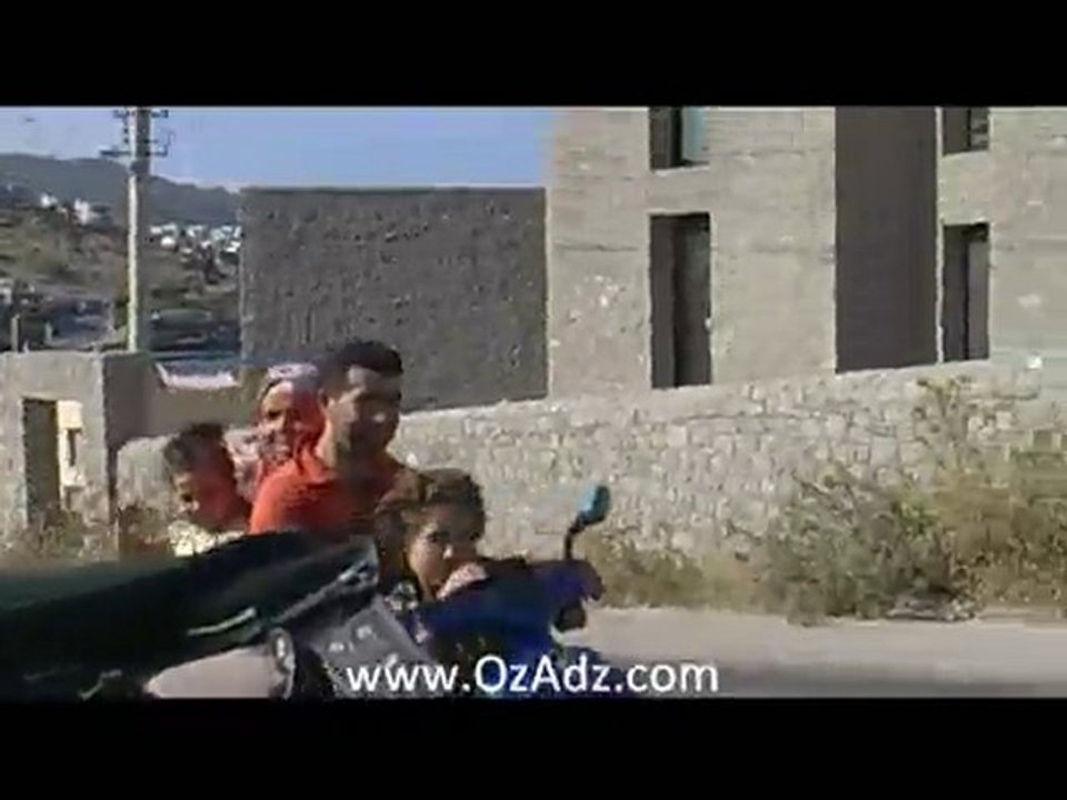 Family riding scooter bike