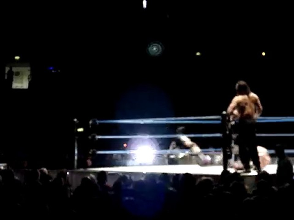 Kane top rope clothesline