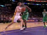 Pau Gasol drives past a defender and finishes with a tough s