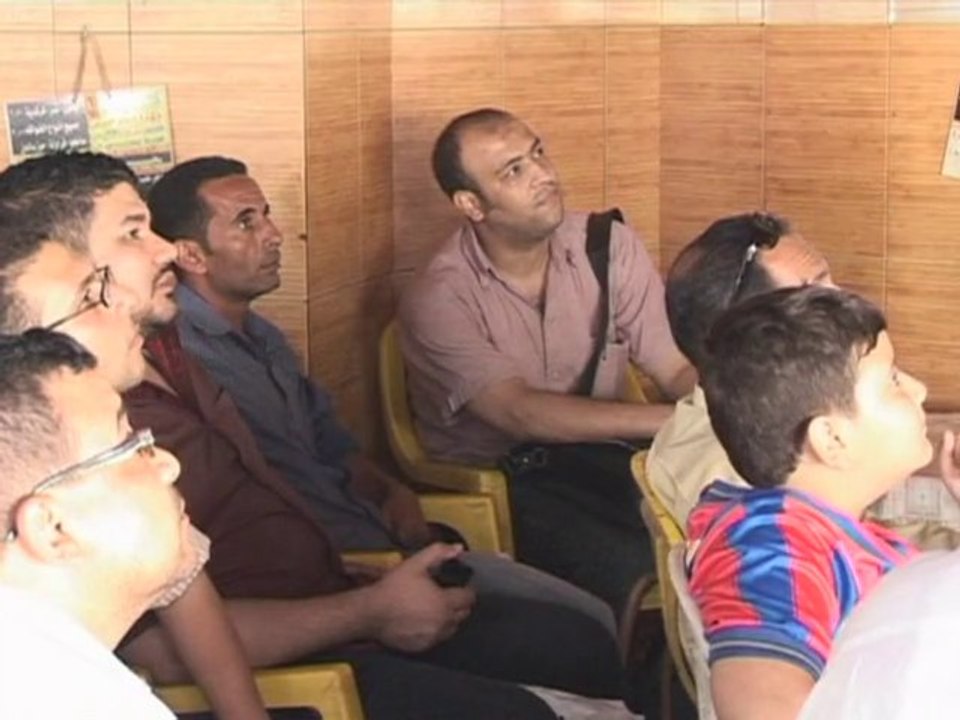 Left out: Egyptians watch on as Algeria plays W...