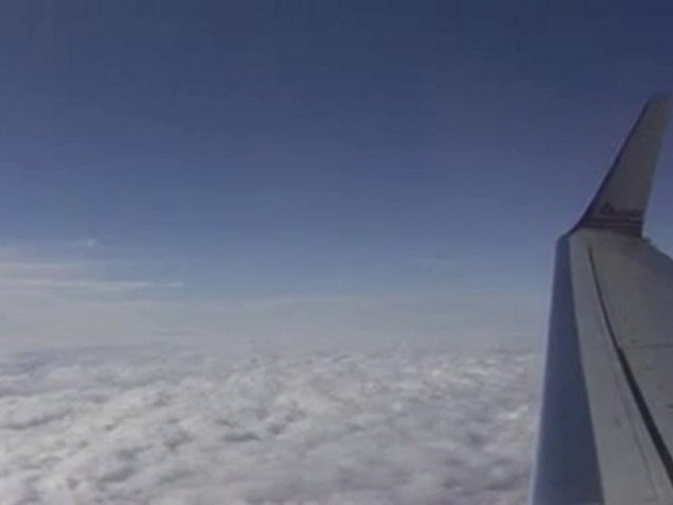 Airplane Window View of Wing