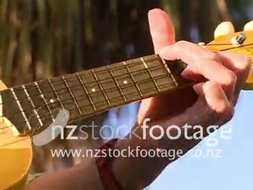 Woman Strumming Ukulele HD
